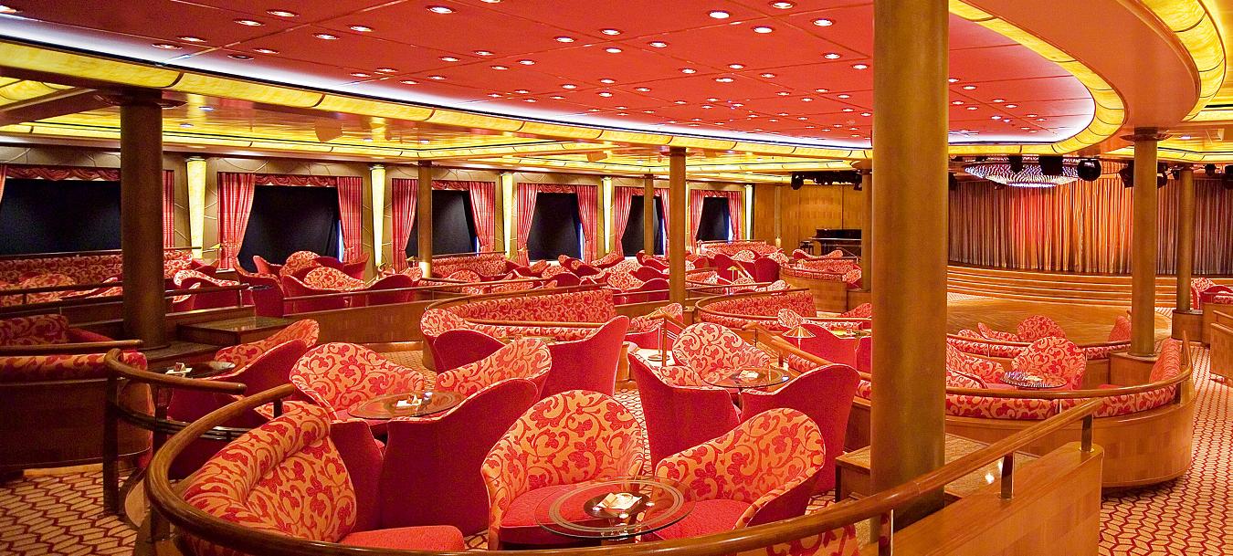 El elegante Europa Lounge donde tienen lugar los más increibles espectáculos, con estrellas de la Ópera, y artistas de fama internacional MS EUROPA el mejor Crucero del Mundo Numero 1 GUIA BERLITZ DE CRUCEROS